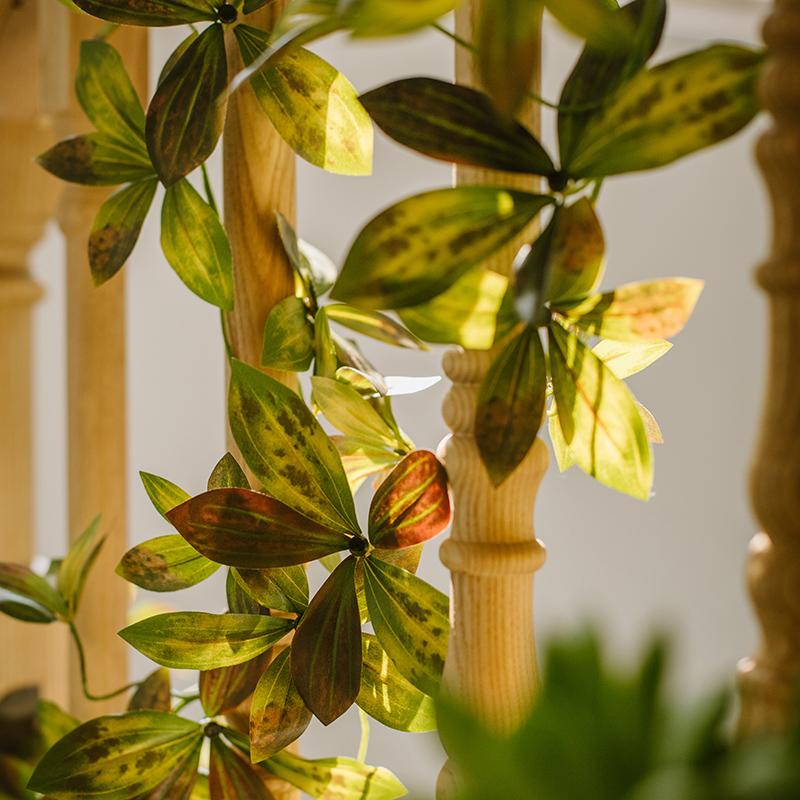 Artificial vine with brown-green leaves on light wood posts 69-in on Tampa Home & Garden Store