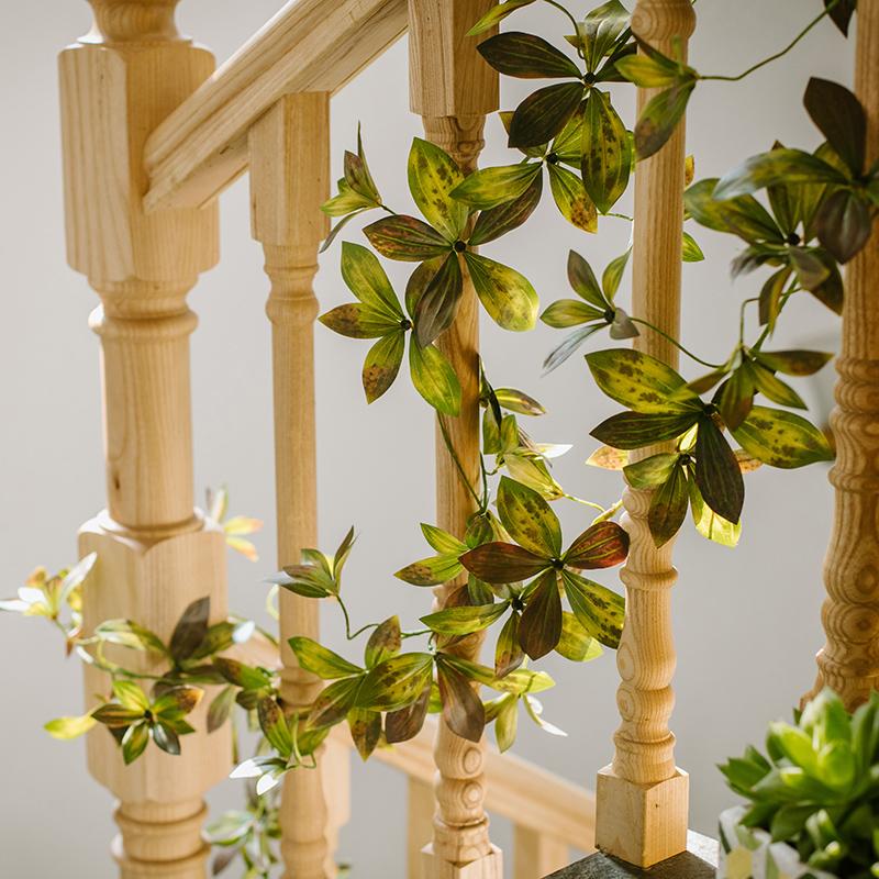Artificial plant brown-green large leaf vine draping wood railing, 69in long RusticReach on Tampa Home & Garden Store
