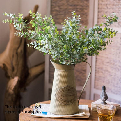 Artificial eucalyptus stems in a beige ribbed metal vase, 26in tall, 5-stem bouquet on Tampa Home & Garden Store