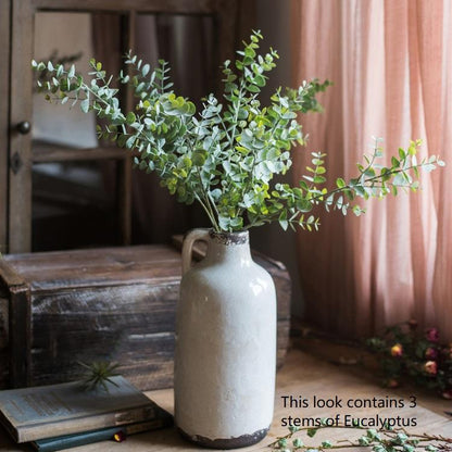 RusticReach Artificial Eucalyptus stems in a tall ceramic vase with green leaves, 3 stems on Tampa Home & Garden Store