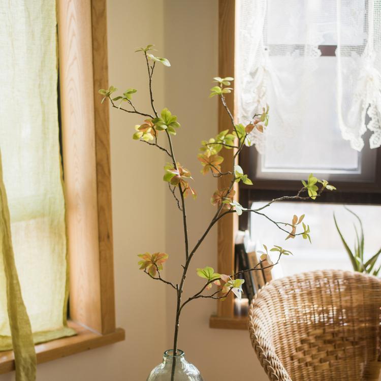 Artificial Japanese Zen Leaf Stem 34in tall with green leaves on brown branches in a glass vase on Tampa Home & Garden Store