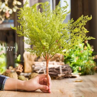 Artificial Oba Fern Stem 18-inch tall, RusticReach, bright green fern on brown stem held by hand on Tampa Home & Garden Store