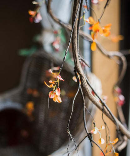 Artificial plant red vine leaf stem faux with orange-red leaves and twisting brown stems on Tampa Home & Garden Store