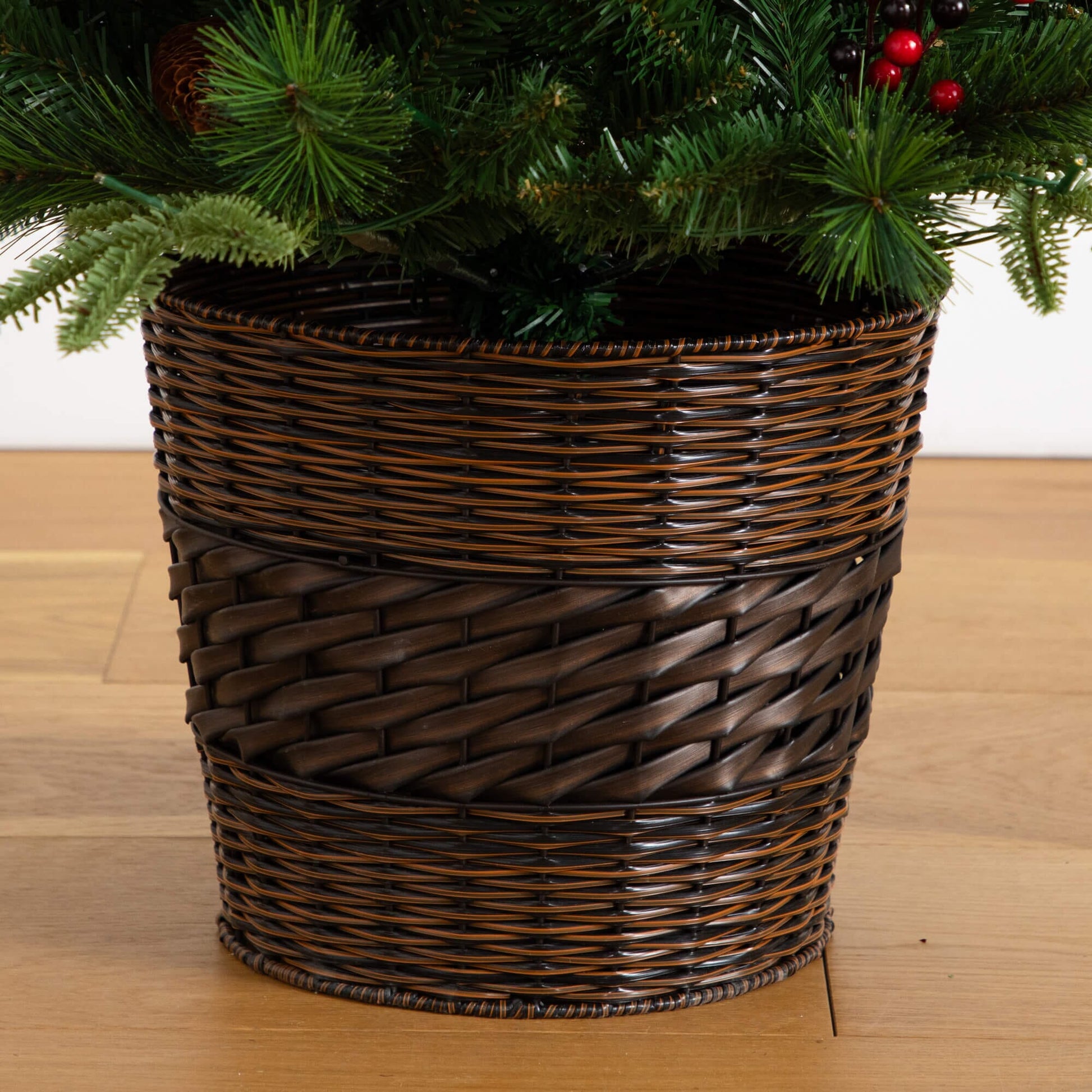 Nearly Natural artificial greenery in a dark wicker basket with pinecones and berries on Tampa Home & Garden Store
