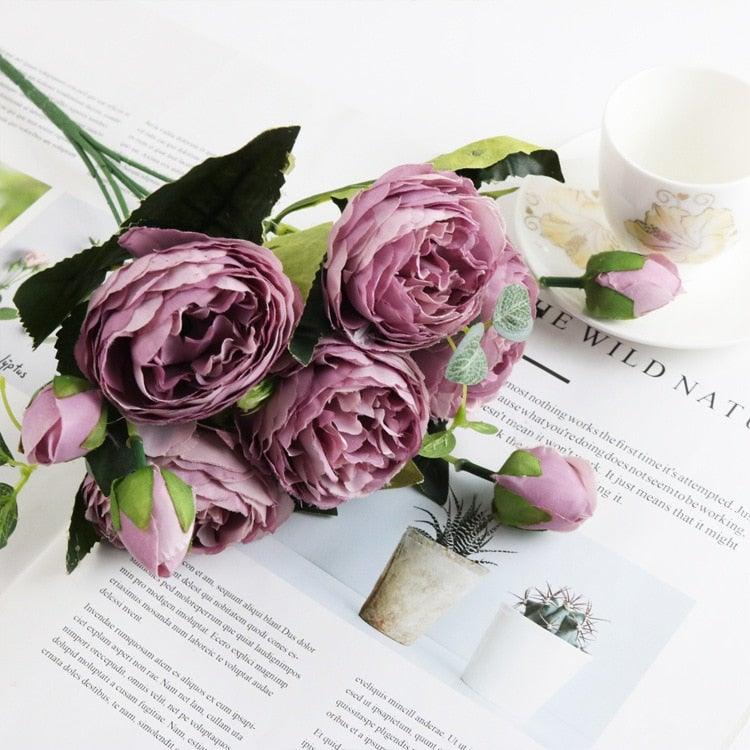 Silk rose bouquet with pink peony-style blooms and green leaves for wedding decor on Tampa Home & Garden Store