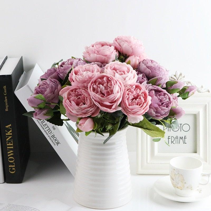 Artificial silk rose bouquet with pink and lavender blooms in a white ribbed vase on Tampa Home & Garden Store