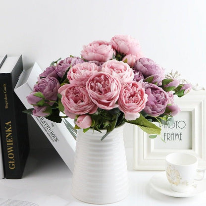 Artificial silk rose bouquet with pink and lavender blooms in a white ribbed vase on Tampa Home & Garden Store