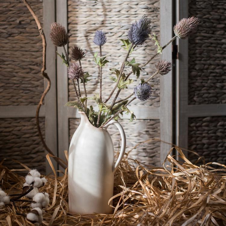 Faux silk thistle stems RusticReach with purple heads in a white pitcher, 26 inches tall on Tampa Home & Garden Store