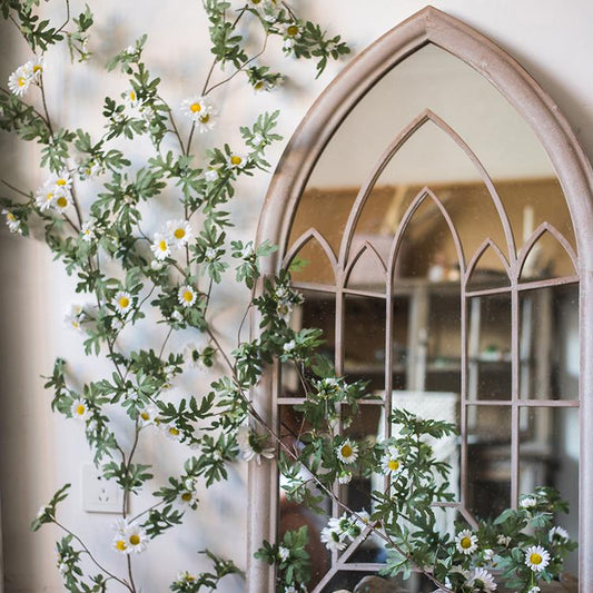 Artificial Sunflower Vine White 67-inch long with green foliage wrapping an arch mirror on Tampa Home & Garden Store
