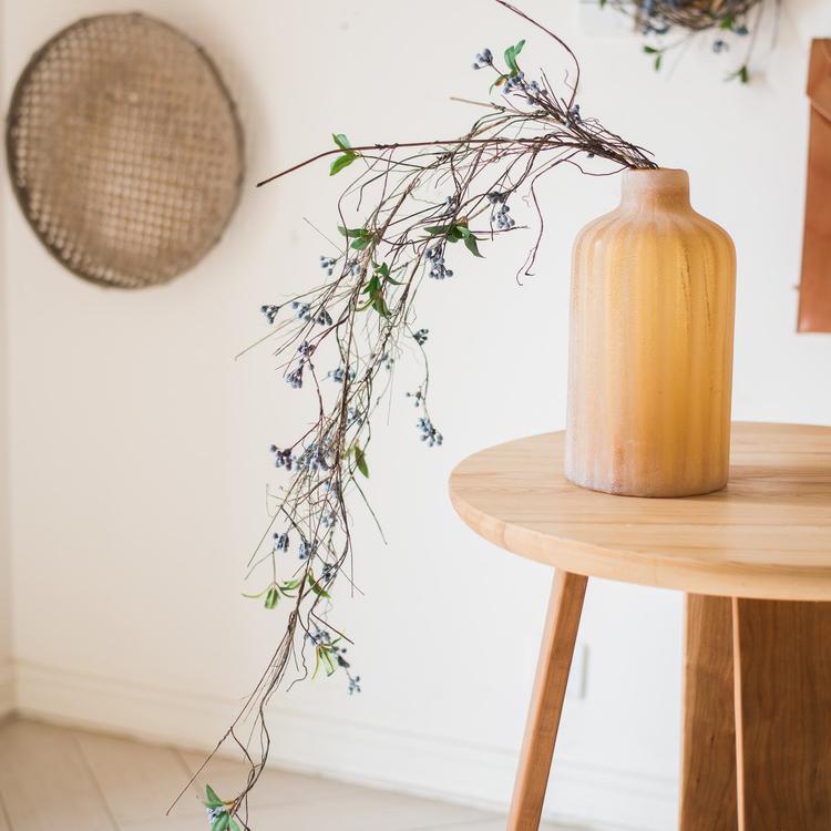 Artificial Wild Blueberry Hanging Vine, 43 inches long, wispy stems with berries in a wooden vase on Tampa Home & Garden Store