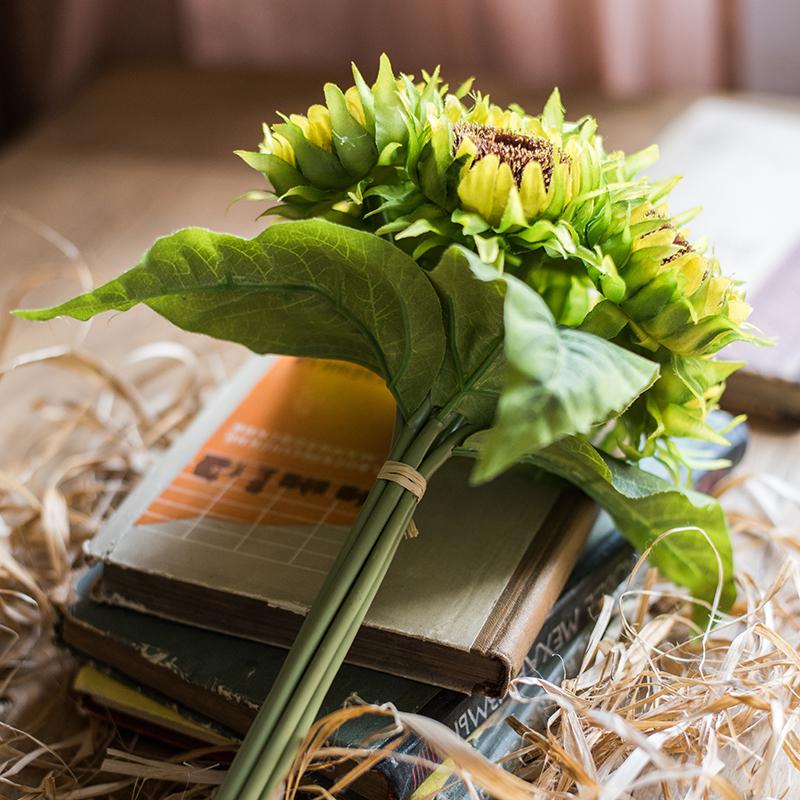 Artificial silk yellow sunflower bouquet RusticReach, 13\" tall with green bound stems on books on Tampa Home & Garden Store