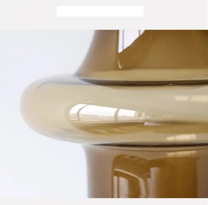 Amber glass bulbous vase by Decorbites; glossy amber finish on Tampa Home & Garden Store