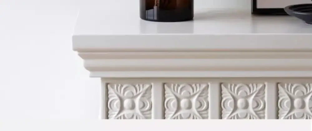 Amber glass bulbous vase by Decorbites on a white mantel with decorative molding on Tampa Home & Garden Store