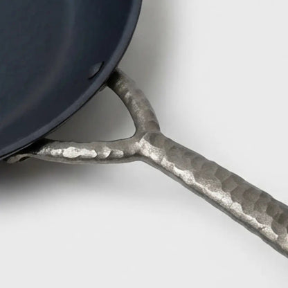 Carbon steel frying pan with a textured hammered handle on Tampa Home & Garden Store