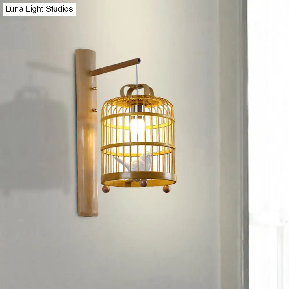 Decorbites wood cage design wall sconce lamp in warm gold finish with bird figure on Tampa Home & Garden Store