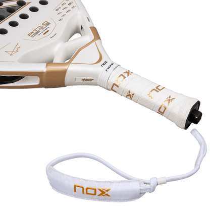 NOX AT10 Genius 12K Alum Xtreme 2026 padel racket white and gold with wrist strap on Tampa Home & Garden Store