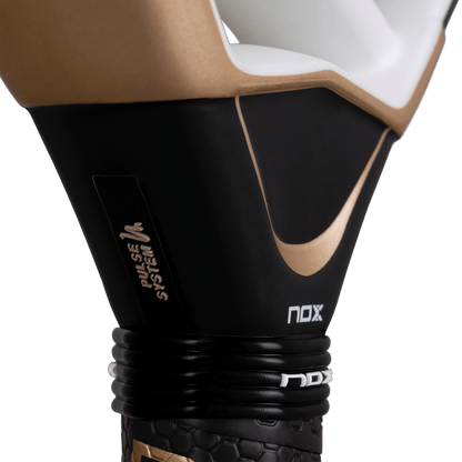 NOX AT10 Genius 18K Alum padel racket handle close-up in black with gold trim Power System branding on Tampa Home & Garden Store