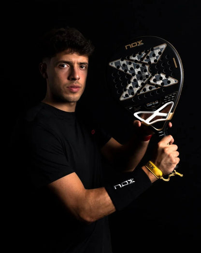 NOX AT10 Genius 18K Alum padel racket black with silver star lattice and white grip on Tampa Home & Garden Store