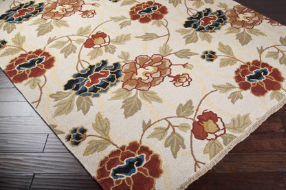 Area rug beige field with red, blue, tan floral pattern by Boutique Rugs on Tampa Home & Garden Store