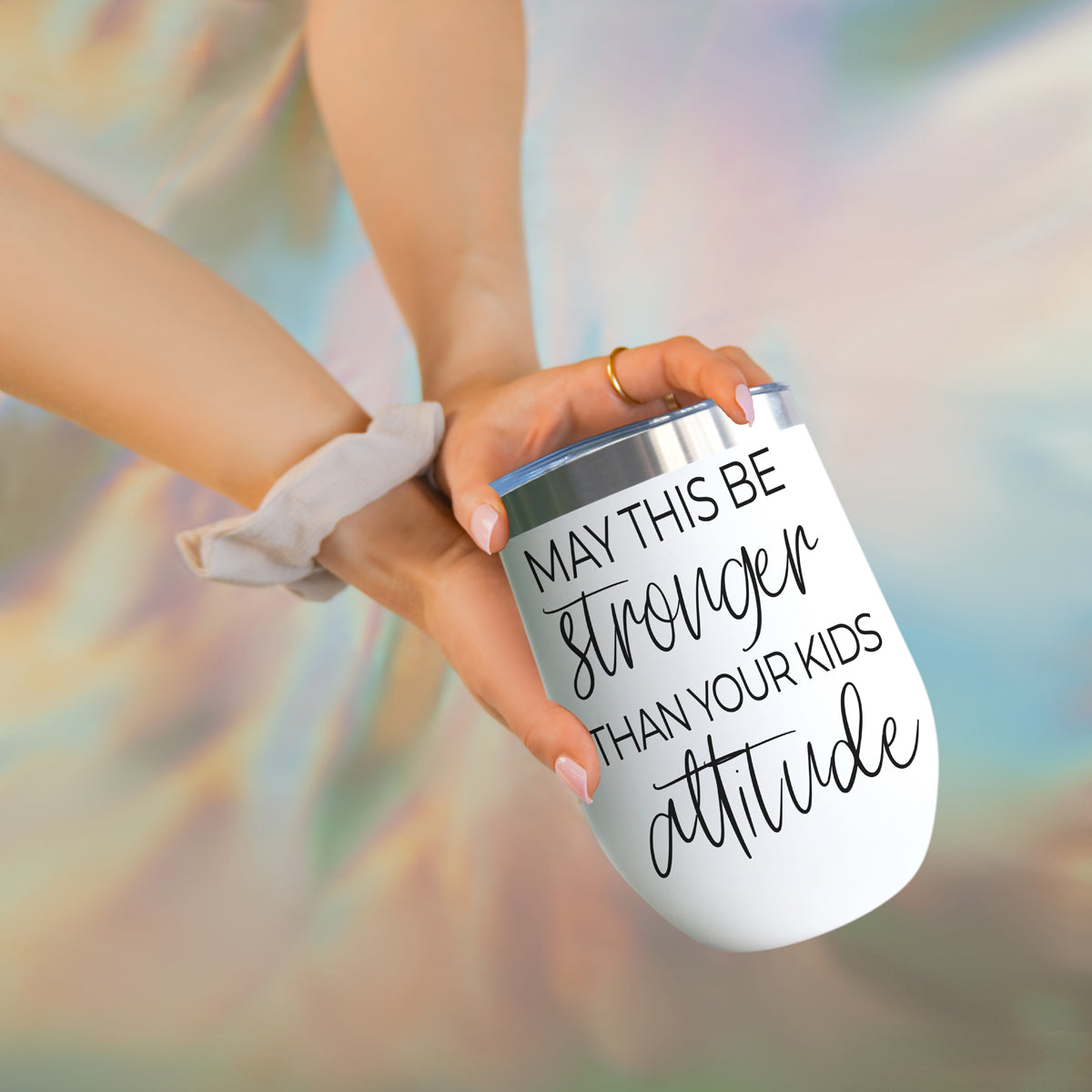 Kids Attitude 17oz tumbler by Gia Roma, white with black script, held by hands on Tampa Home & Garden Store