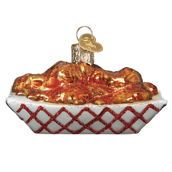 Décoration d'ailes de poulet épicées avec sauce
