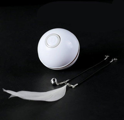 Stevvex white automatic smart cat toy ball with USB recharge, spinning LED light and feather on Tampa Home & Garden Store