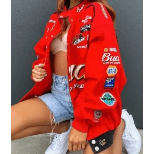 Stevvex red printed oversized coat jacket with patch logos, worn by woman in denim shorts on Tampa Home & Garden Store