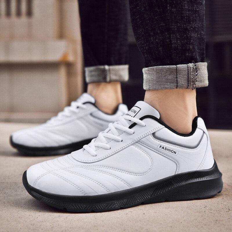Stevvex white sneakers, lace-up casual athletic shoes with black sole and sporty design on Tampa Home & Garden Store