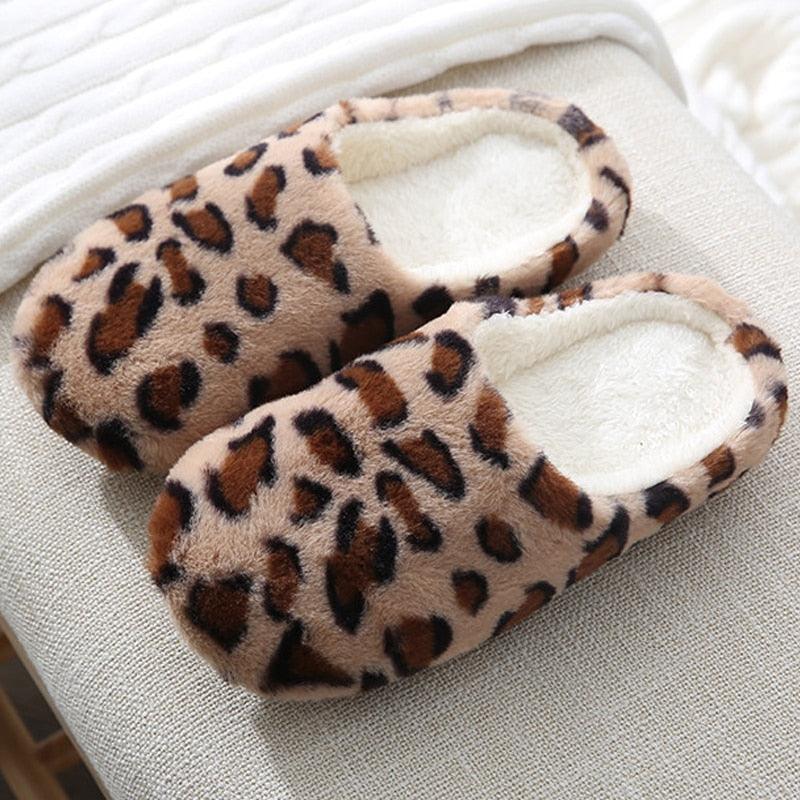 Leopard print plush home slippers pair with soft fleece lining for indoor wear on Tampa Home & Garden Store