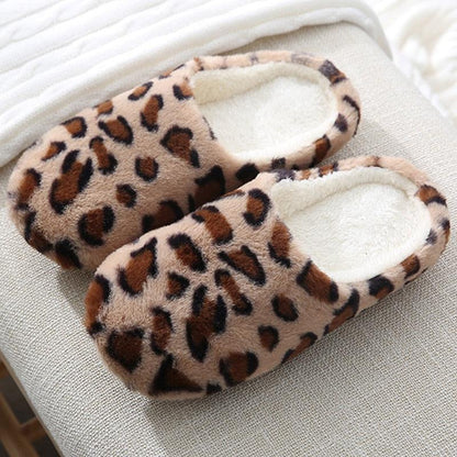 Leopard print plush home slippers pair with soft fleece lining for indoor wear on Tampa Home & Garden Store