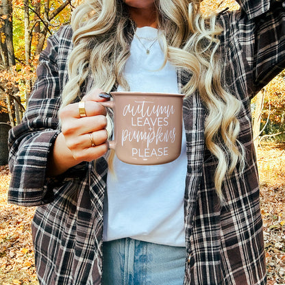 Gia Roma Autumn Leaves coffee mug, dusty rose ceramic with white script, outdoors in fall on Tampa Home & Garden Store
