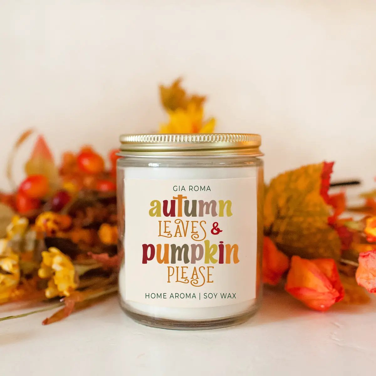 Toasted Pumpkin Spice Candle With Autumn Leaves