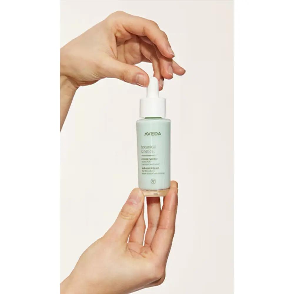 Aveda Botanical Kinetics Intense Hydrator bottle with white dropper cap in pale green glass on Tampa Home & Garden Store