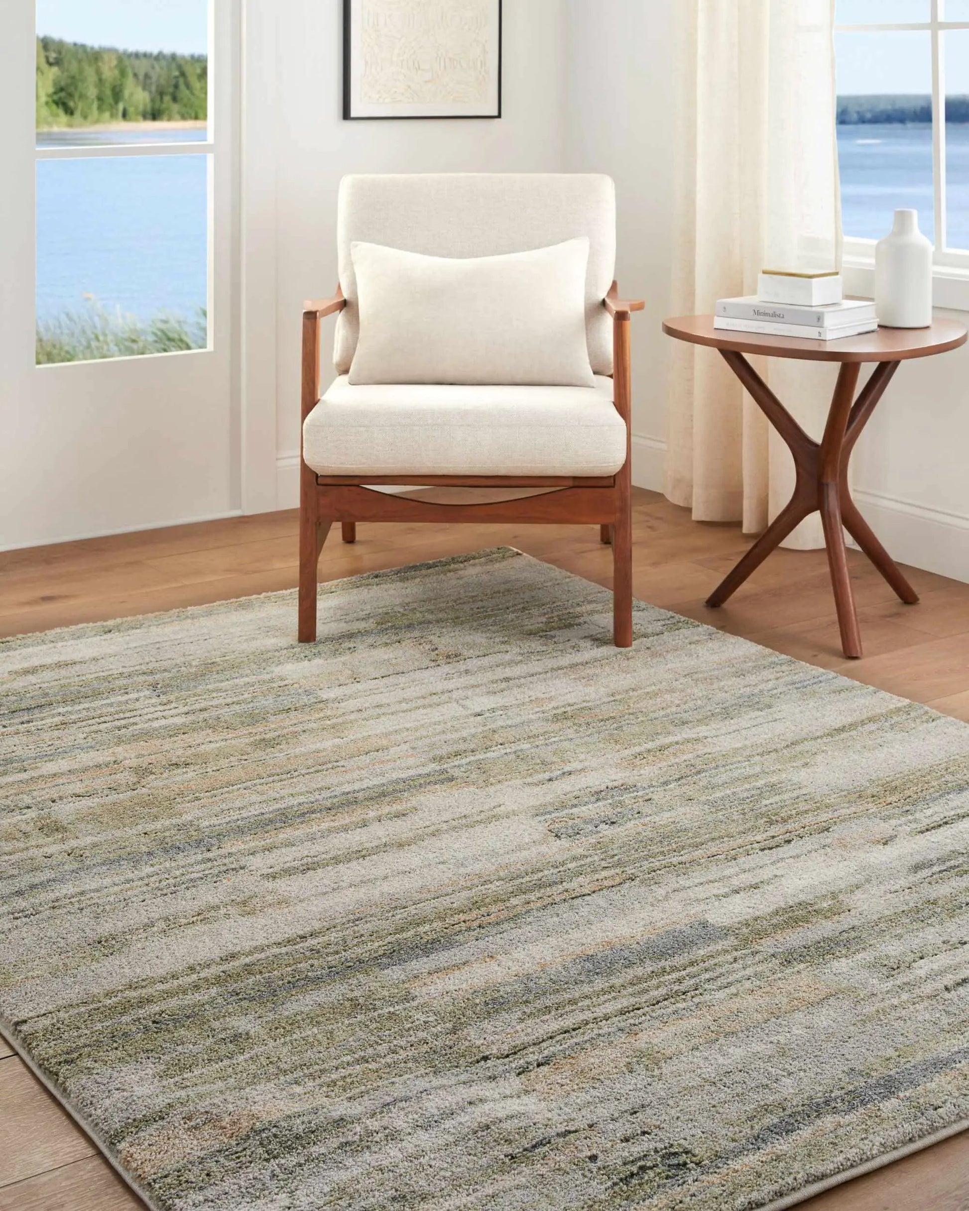 Yancy Thick Luxe Rug in soft beige with a subtle gray-green, textured variegated pattern on Tampa Home & Garden Store