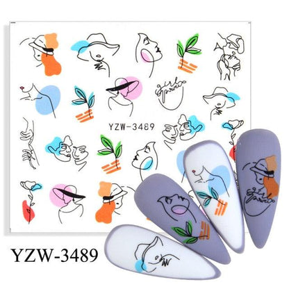 Avocado-themed nail stickers sheet by Stevvex with line-art faces on lavender nails on Tampa Home & Garden Store