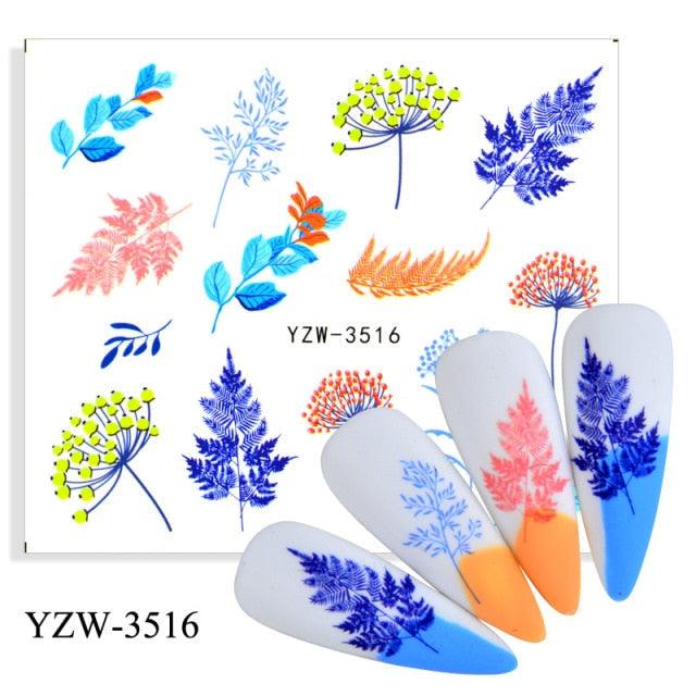 Botanical nail art stickers sheet YZW-3516 by Stevvex with blue leaf designs and gradient tips on nails on Tampa Home & Garden Store