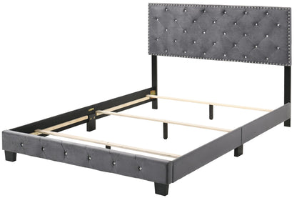 Luxurious upholstered bed with gray tufted headboard, diamond tufting and nailhead trim on Tampa Home & Garden Store