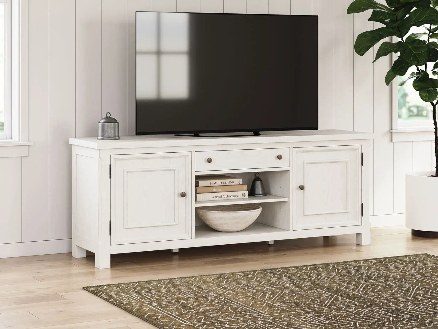 Robbinsdale Extra Large TV Stand Antique White with TV on top and storage drawers on Tampa Home & Garden Store