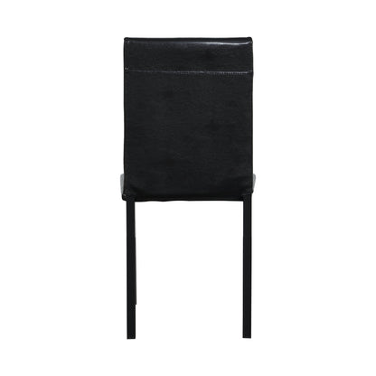 Black faux-leather dining chair back with slim metal legs on Tampa Home & Garden Store