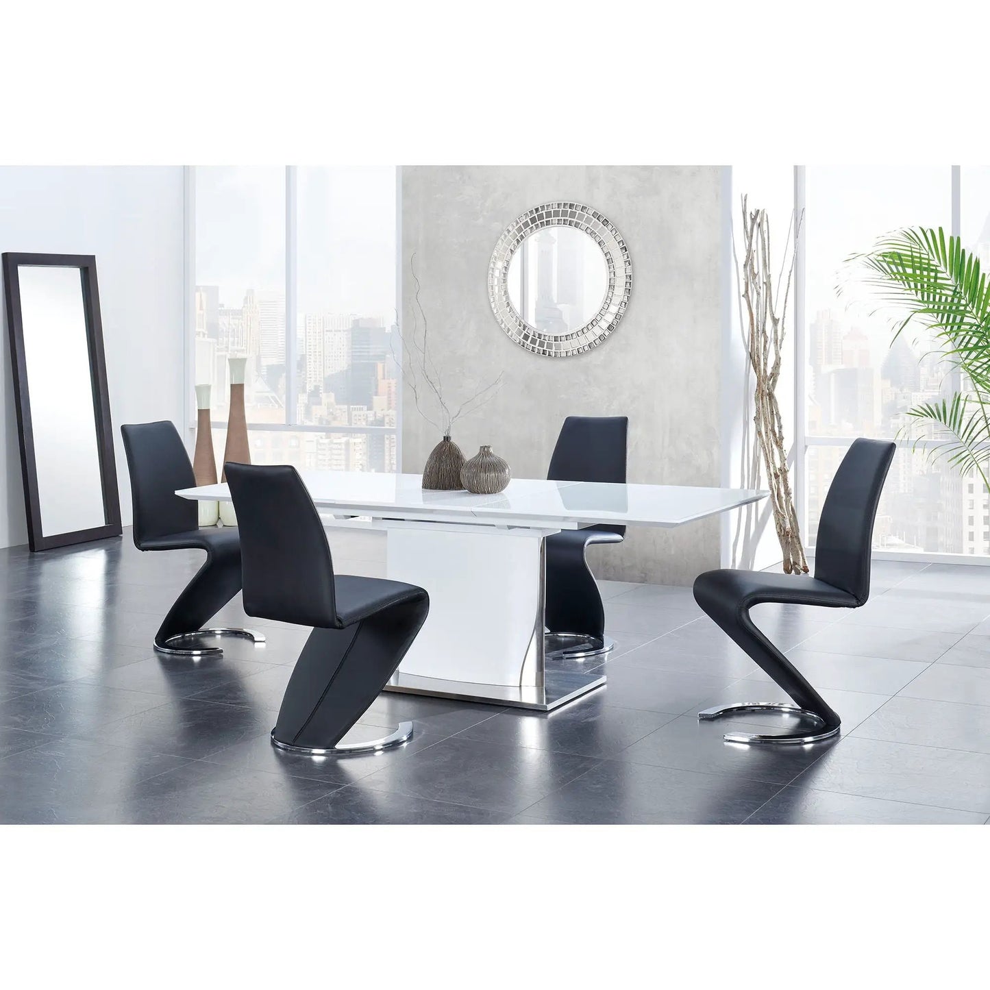Marcus Horseshoe Dining Chairs set of 2 in black leather with chrome bases around a white table on Tampa Home & Garden Store