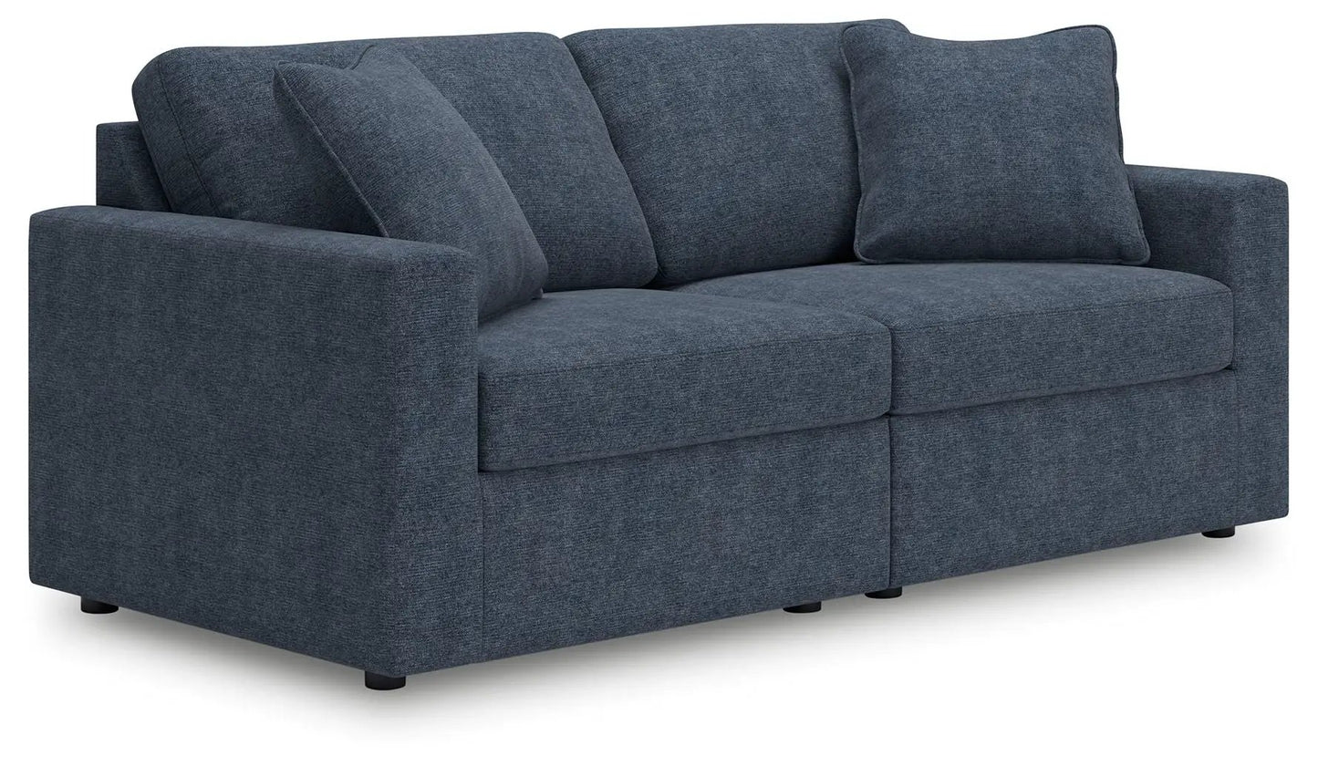 Modmax Sectional Ink by Unique Piece Furniture in blue textured fabric with cushions and pillow on Tampa Home & Garden Store