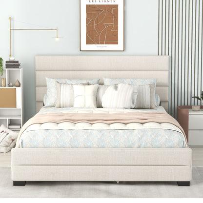 Queen platform bed beige upholstered with tall padded headboard in a modern bedroom on Tampa Home & Garden Store