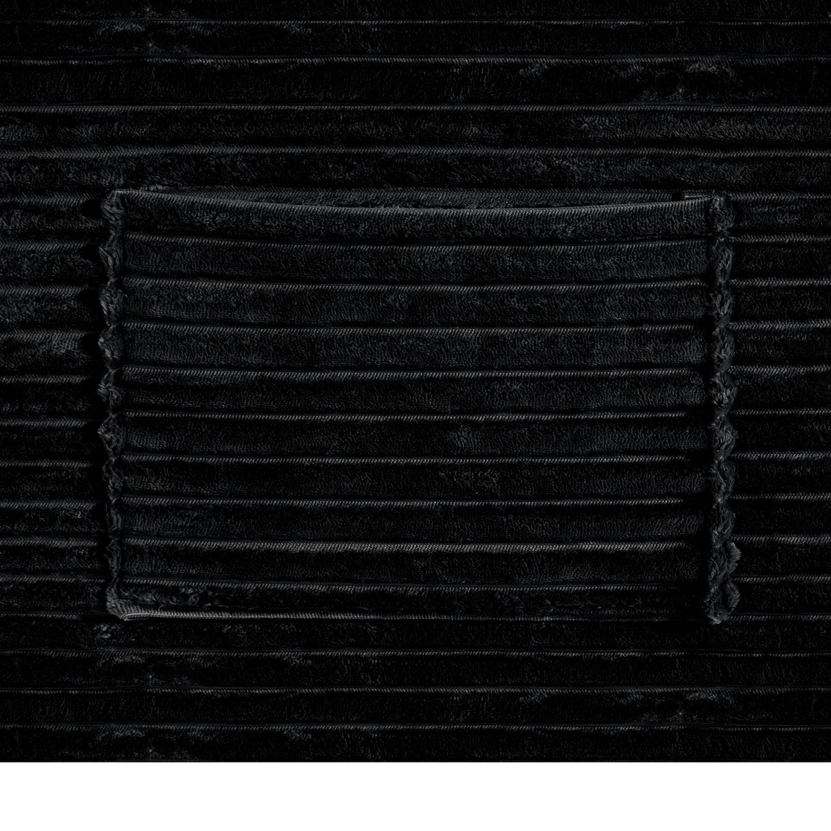 Sectional sofa fabric close-up in black with visible stitching on Tampa Home & Garden Store