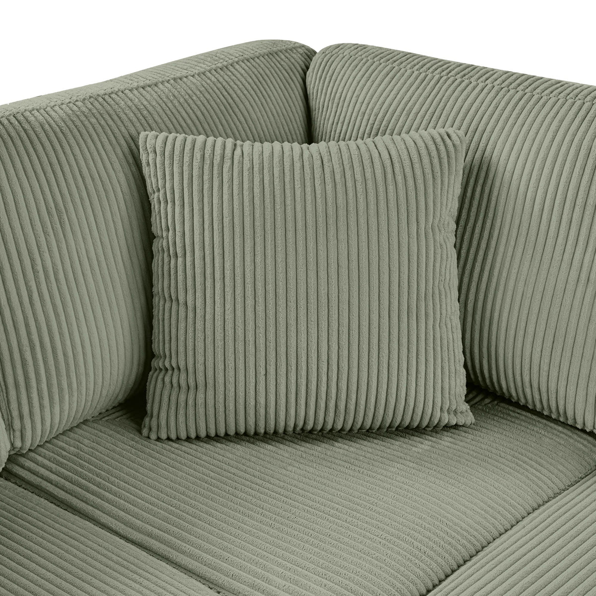 Oversized U-shaped sectional sofa in sage-green corduroy with three matching throw pillows on Tampa Home & Garden Store