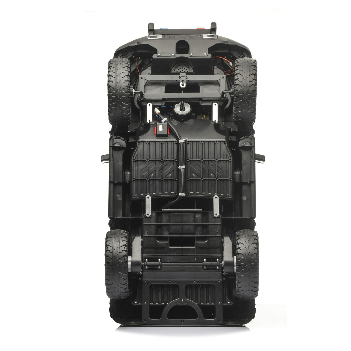 12V Kids Ride-On Car chassis underside with rugged off-road tires on Tampa Home & Garden Store