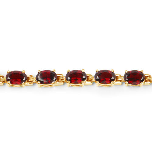 Bracelet with six oval garnet stones in gold-tone prong settings on Tampa Home & Garden Store