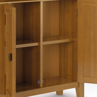 Redmond handcrafted low storage cabinet with open interior shelf in warm wood finish on Tampa Home & Garden Store
