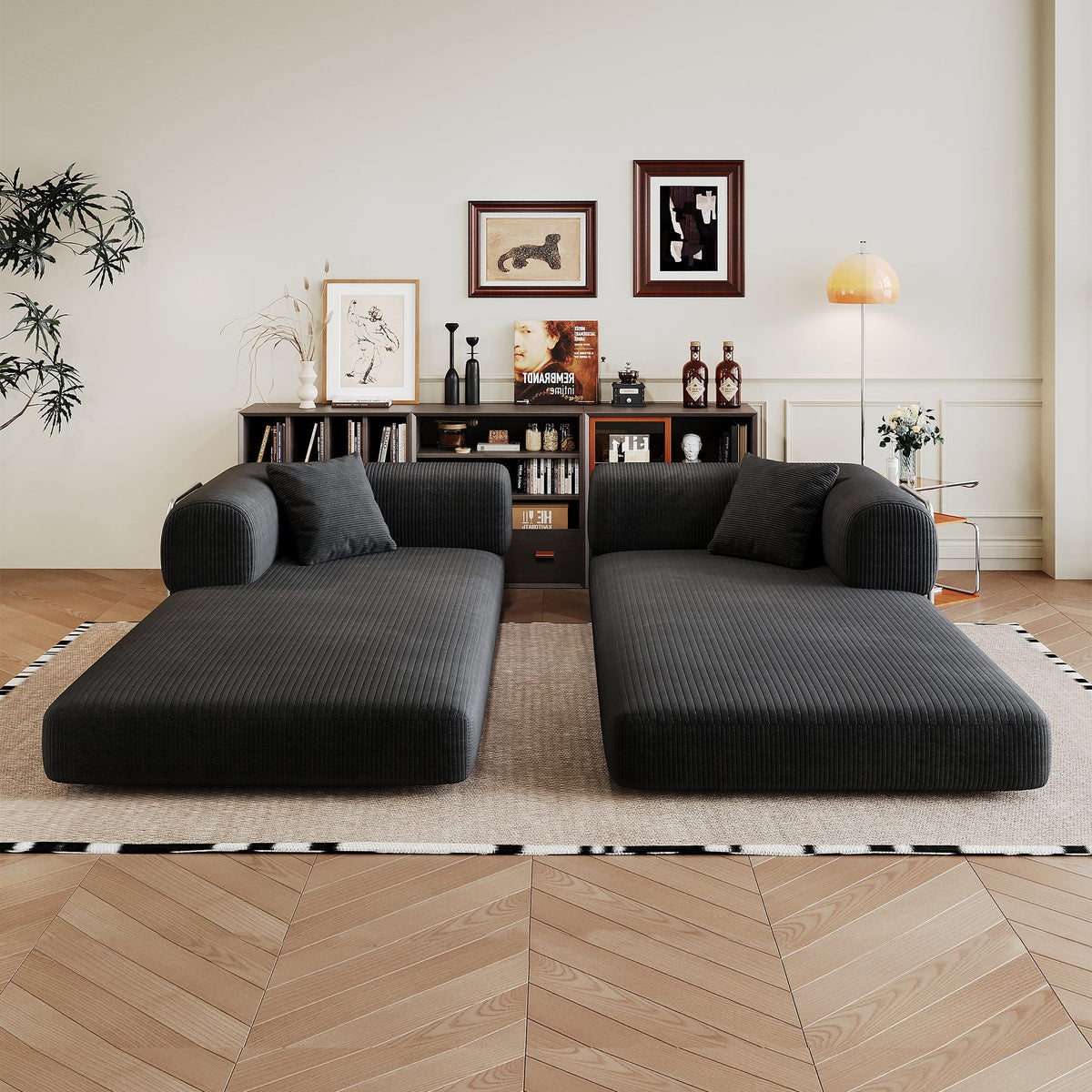 Corduroy black modular sectional sofa with pillow-back cushions in a modern living room on Tampa Home & Garden Store