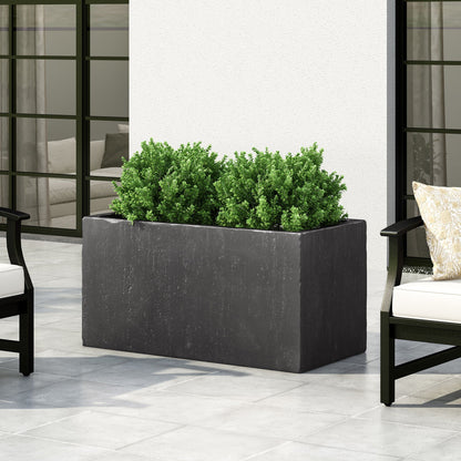 HouseOfZazla Modern Outdoor Planter dark gray stone-look planter with lush green shrubs on Tampa Home & Garden Store