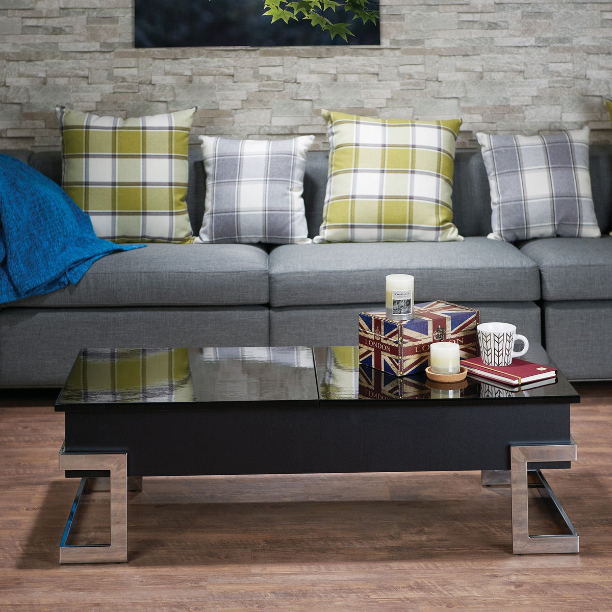 High-gloss black coffee table with chrome legs in a modern living room on Tampa Home & Garden Store